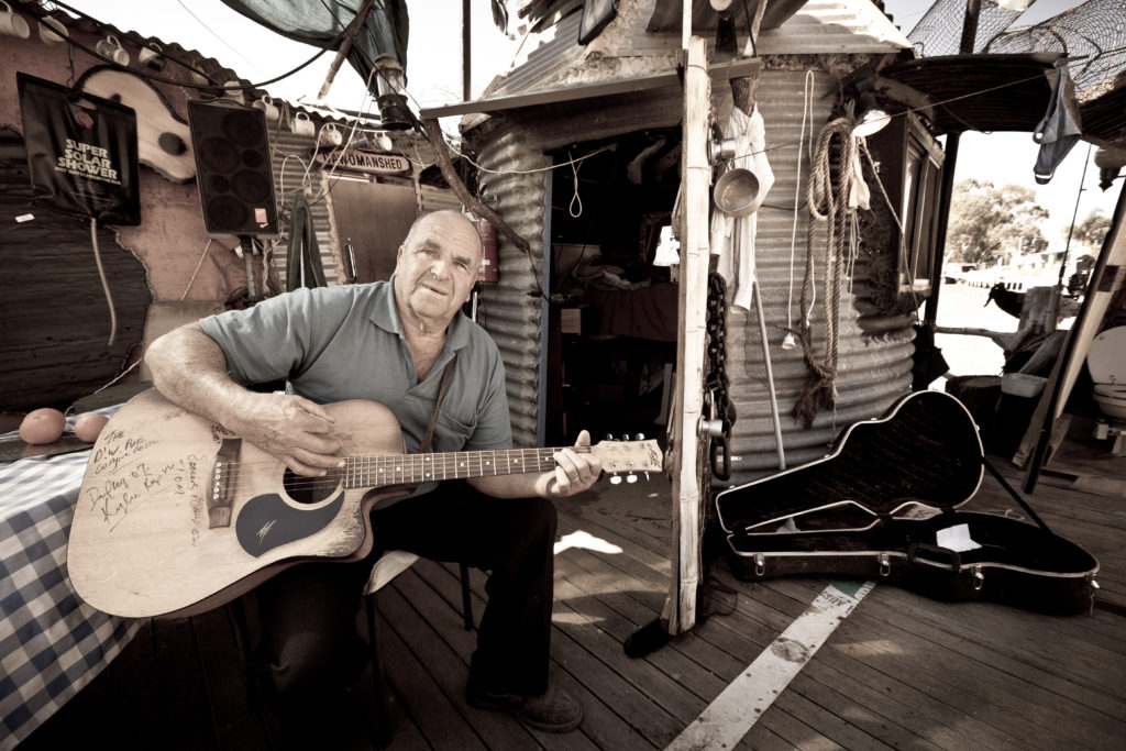 Musician Frank Turton on his houseboat, Renmark 2011. Commercial Photography by Excitations Photography