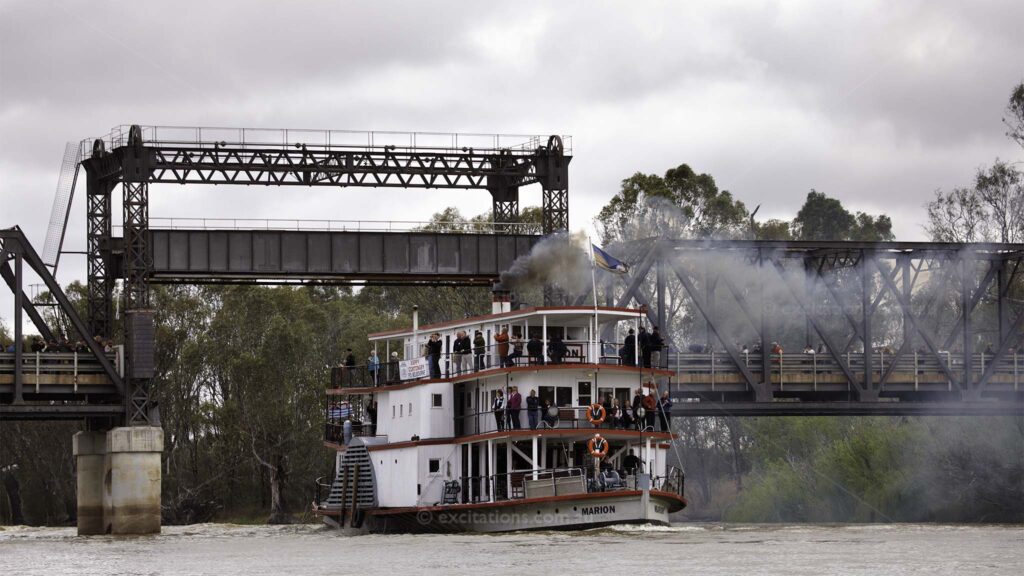 Paddle Boat, PS Marion passing under the river bridge between Yelta and Curlwaa. From a story, Paddle Boats of the Murray-Darling at Excitations, photography